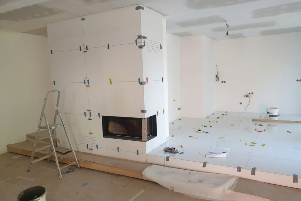 trockenbauarbeiten an kamin, fußboden und wände erneuert, innenausbauarbeiten in offenem wohnraum