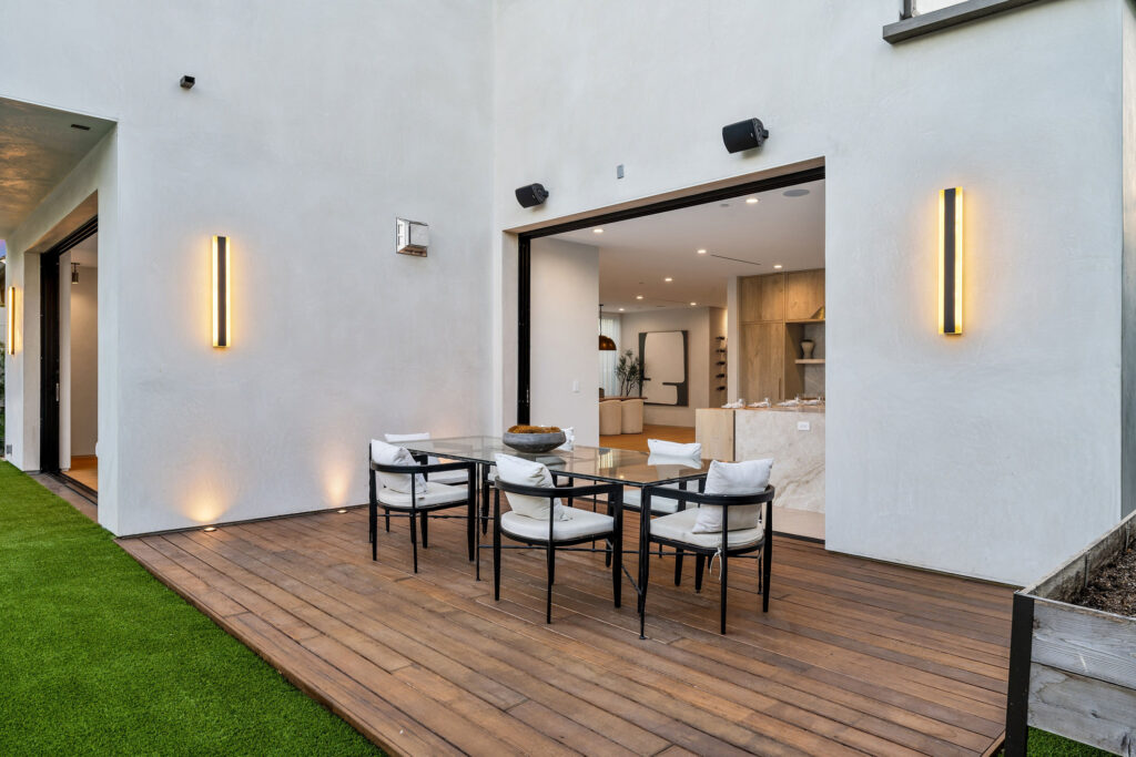 Modern outdoor patio with stylish furniture